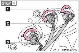 Turn the bulb base counterclockwise.