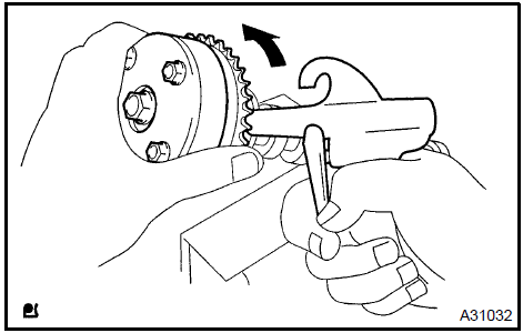 e. Remove the fringe bolt from the camshaft timing gear.