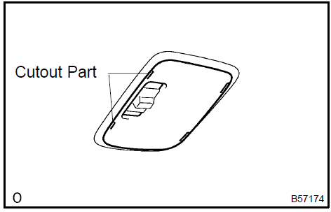 b. Using a screwdriver, remove the room lamp assembly