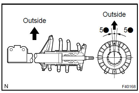 f. Install the front coil spring seat upper LH to the shock absorber