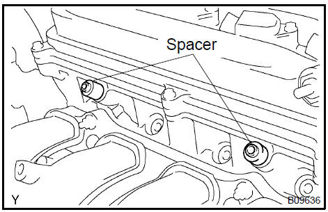 c. Temporarily install the 2 bolts holding the delivery pipe to