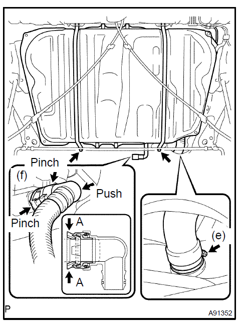 h. Remove the 2 pins and 2 fuel tank bands as shown in the