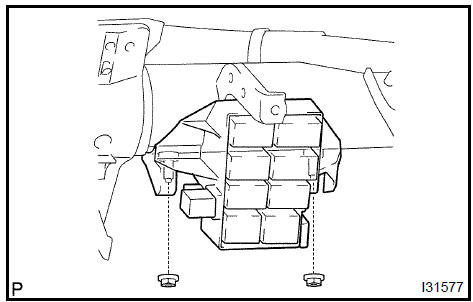 d. Install the driver side junction block with the 3 nuts.Torque: 8.4