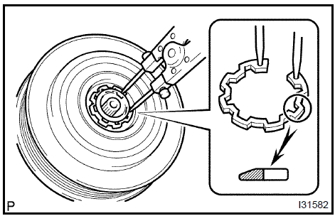 f. Using SST, hold the magnet clutch hub and install the