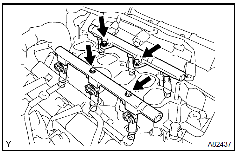 c. Remove the 4 delivery pipe No. 1 spacers ( 1) and 6 insulators