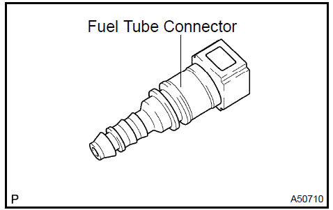 d. Remove the fuel pipe clamp from the fuel tube connector.