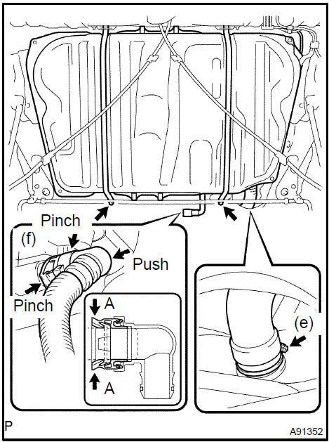 h. Remove the 2 pins and 2 fuel tank bands as shown in the