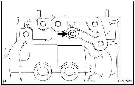 b. Using a pin punch (ϕ 5 mm), remove