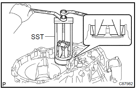 Remove output shaft front bearing