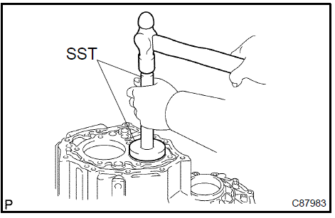 Remove output shaft rear bearing