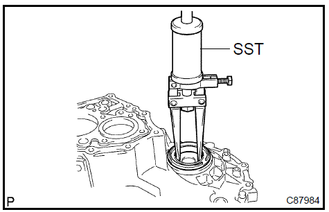 Remove transmission case oil seal