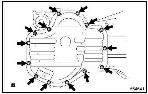 b. Insert the blade of SST between the crankcase and oil