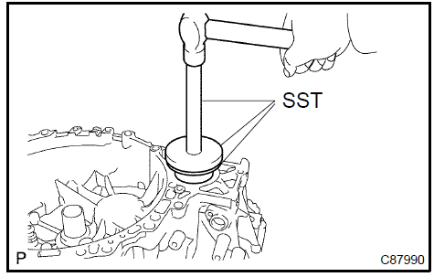 Install front transaxle case cover oil seal