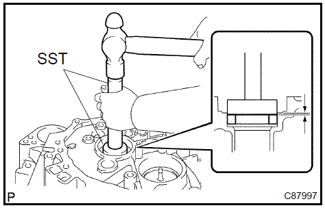 Install front transaxle case oil seal