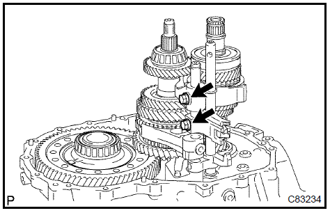 87. INSTALL REVERSE SHIFT FORK ROLLER