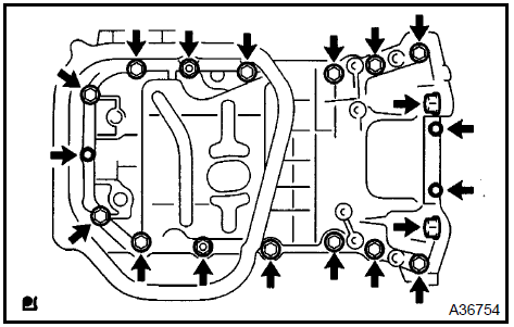 c. Using a screwdriver, remove the oil pan by prying the portions