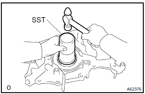 d. Apply a light coat of engine oil to a new O−ring and place