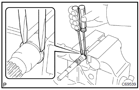 Remove select spring No.1 Seat shaft snap ring