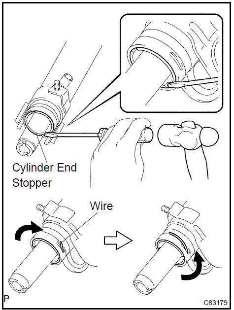  Remove cylinder end stopper