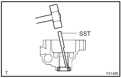 Remove vane pump housing oil seal