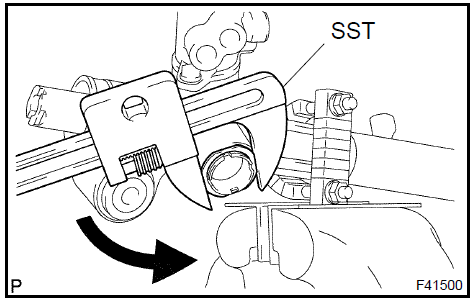 b. Using SST, remove the rack guide spring cap.SST 09631−10021