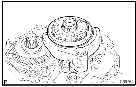 c. Coat the shift fork bolt with sealant, install the gear shift