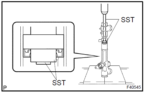 Install power steering cylinder tube oil seal