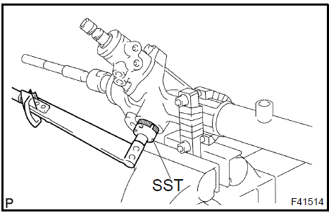 c. Using SST, loosen the rack guide spring cap.SST 09631−10021