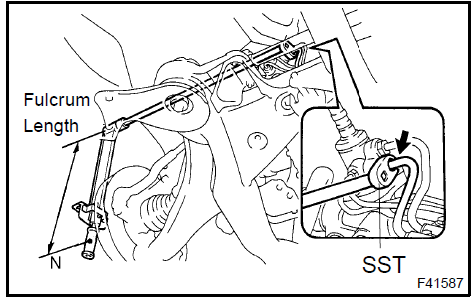 b. Using SST, connect the return tube assy to the rack & pinion