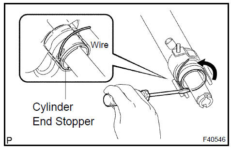  Install cylinder end stopper