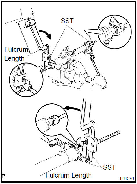 c. Using a brass bar and a hammer, stake the claw washer.