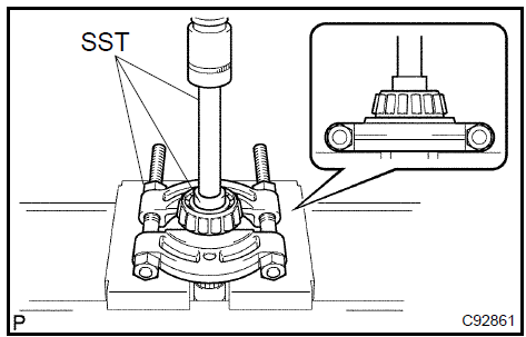 Remove output shaft front bearing