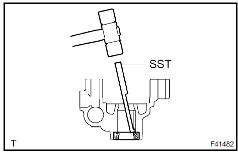 Remove vane pump housing oil seal