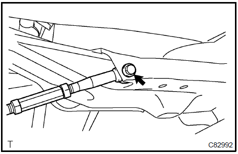 b. Set the suspension arm in the position in the illustration