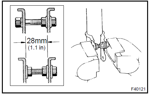 b. Using SST, compress the coil spring.SST 09727−30021