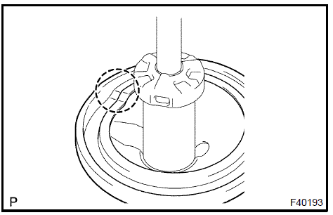 c. Using SST, compress the coil spring.SST 09727−30021