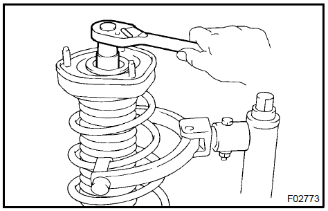 16. INSTALL REAR SHOCK ABSORBER WITH COIL