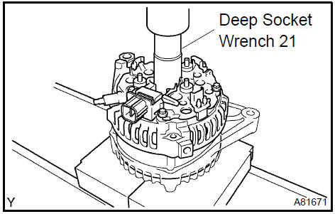 b. Tighten the 4 bolts.Torque: 5.8 Nm (59 kgfcm, 51 in.lbf)