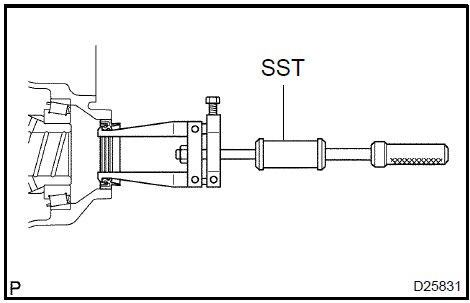 Remove transaxle housing oil seal