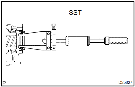 Remove transaxle housing oil seal