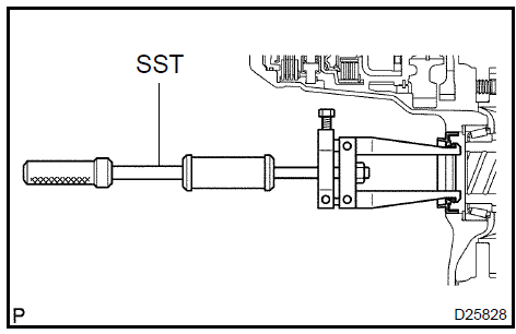 Remove differential side bearing retainer oil seal