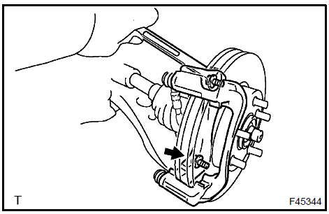 Remove front disc brake cylinder mounting