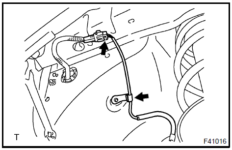 b. Remove the 2 clamp bolts holding the  harness