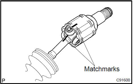 c. Using a snap ring expander, remove the front drive inner