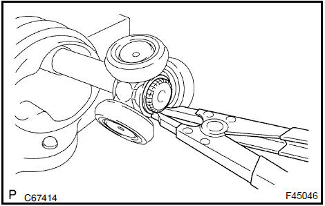 d. Put matchmarks on the outboard joint shaft and tripod