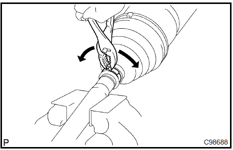 Remove front axle outboard joint boot LH clamp