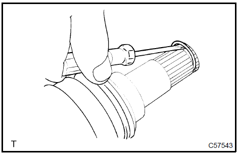 Remove front drive shaft LH hole snap ring