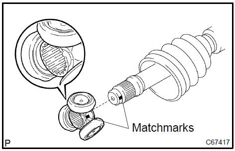 e. Using a snap ring expander, install a new shaft snap ring.