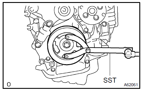 c. Remove the 8 bolts, rear spacer, drive plate and front