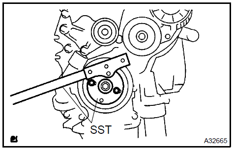 b. Remove the 8 bolts and flywheel.